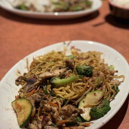 a plate of noodles and vegetables