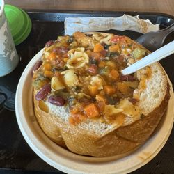 Vegan minestrone soup and a sourdough bread bowl