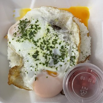 Happa Restaurant - my curry plate with the 2 eggs on top with rice, burger patty and spam hidden, the container is fukujinsuke (sweet raddish) - Izakaya Near Me - Gardena, California