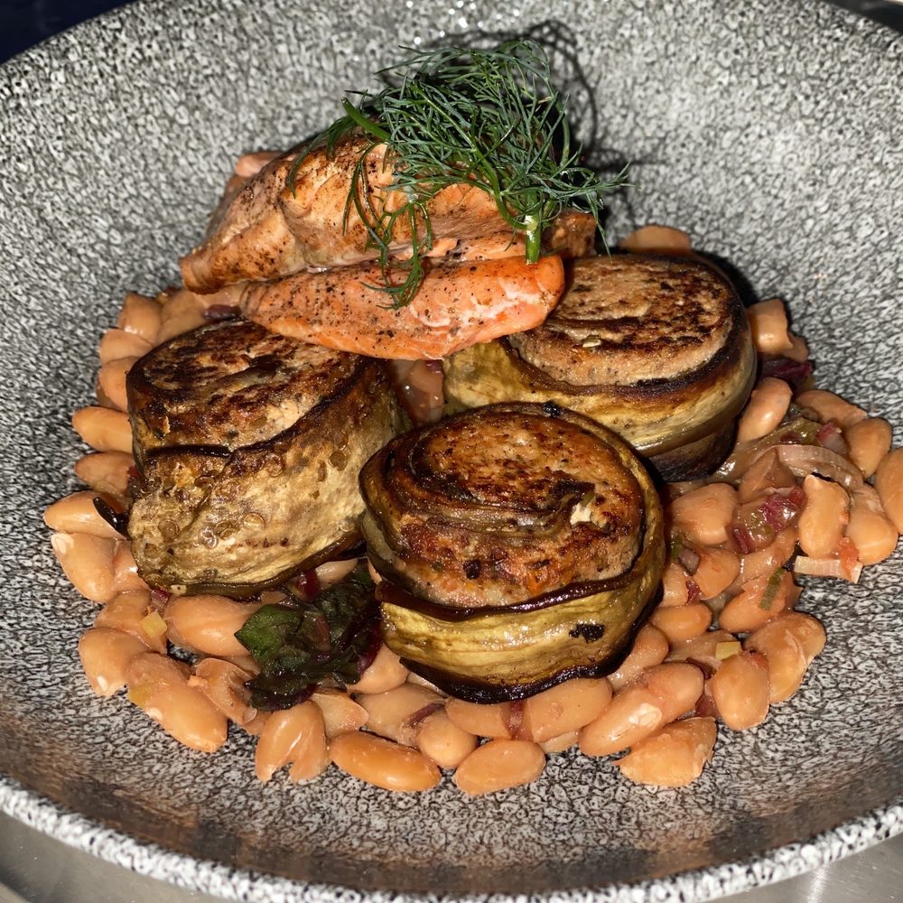 Cadre Restaurant - seared salmon roulade with {very dry eggplant and Thai basil pesto}, served on red chard and tarbais beans. - French Near Me - Madison, Wisconsin Cadre Restaurant - seared salmon roulade with {very dry eggplant and Thai basil pesto}, served on red chard and tarbais beans. - French Near Me - Madison, Wisconsin