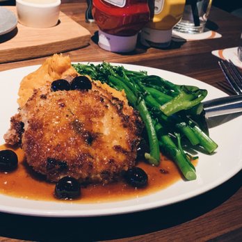 Yard House - Parmesan Crusted Pork Loin* (Featured) - New American Near Me - Sacramento, California Yard House - Parmesan Crusted Pork Loin* (Featured) - New American Near Me - Sacramento, California