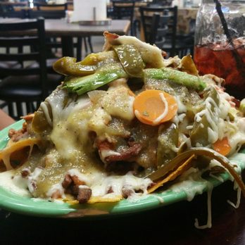 Casa Amiga - The Mucho nachos with sour cream on the side - Mexican Near Me - Grants Pass, Oregon