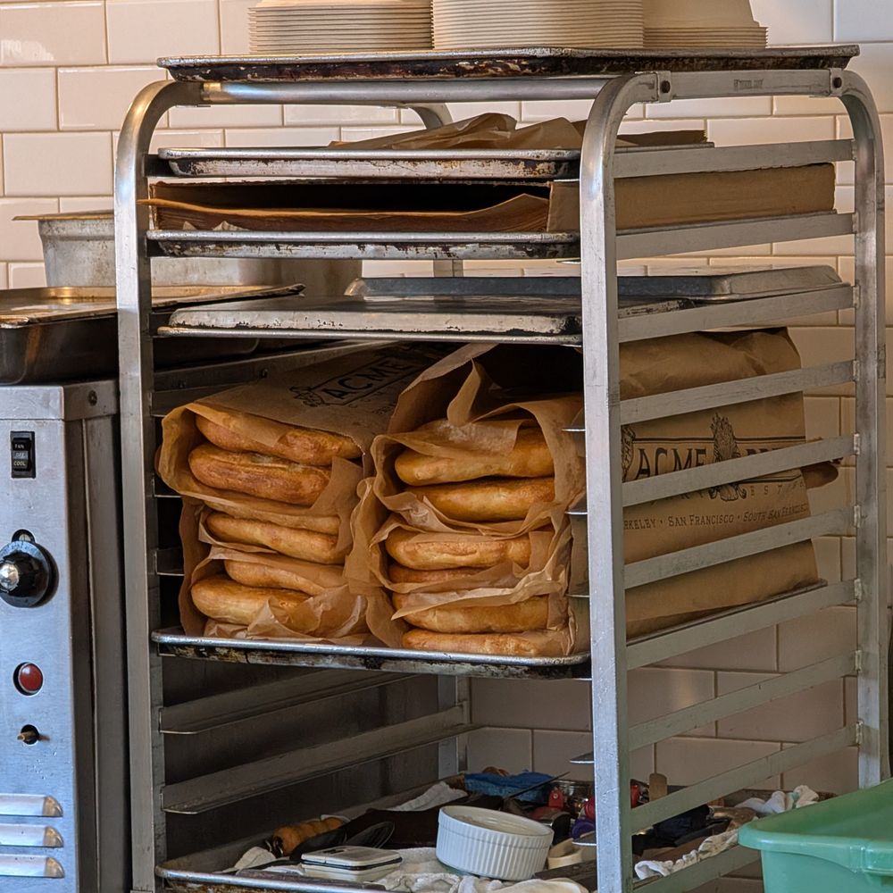 Standard Fare - inside, racks of Acme bread ready to go - Coffee & Tea Near Me - Berkeley, California
