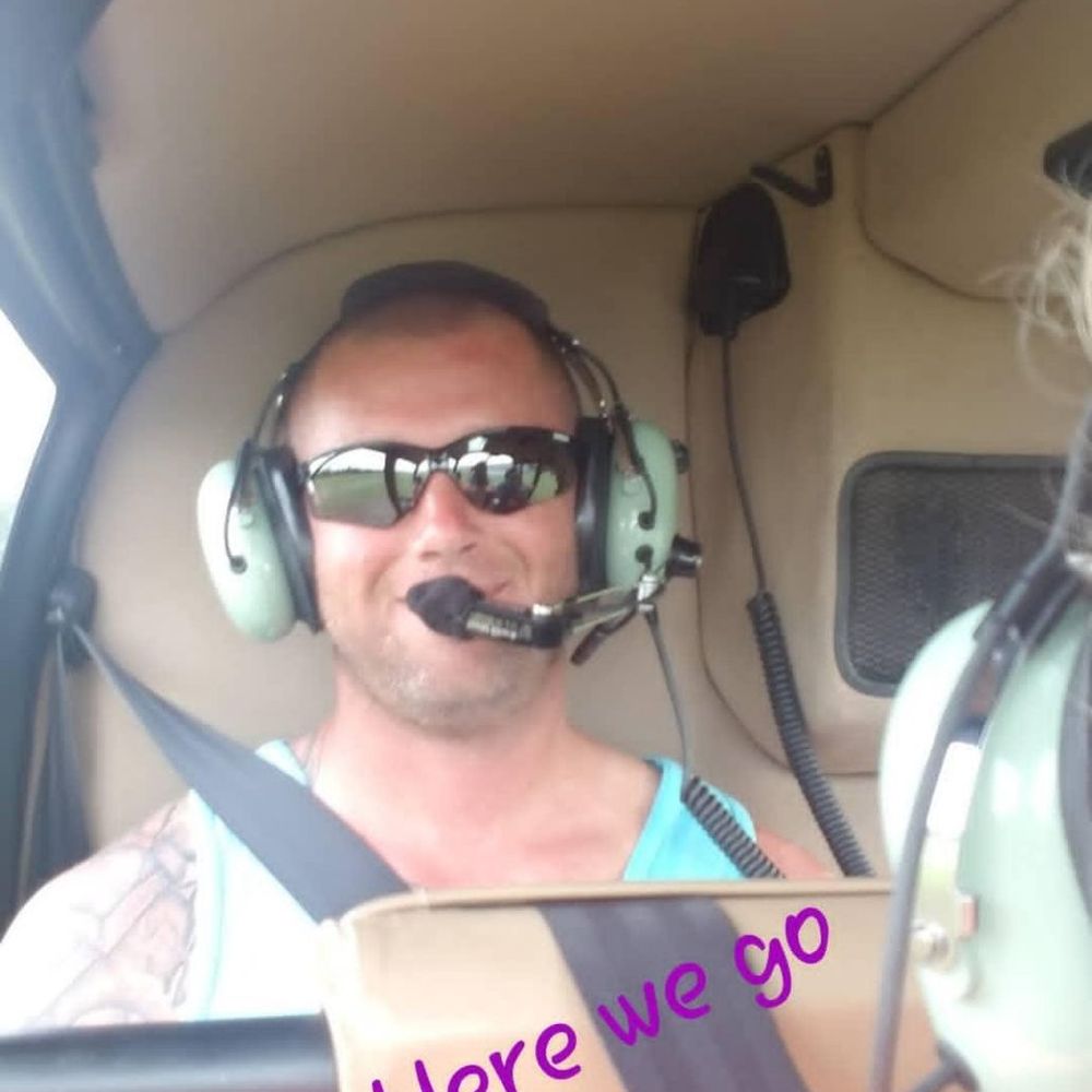 Hang Ten Helicopters - My husband in the back seat - Aerial Tours Near Me - Orange Beach, Alabama Hang Ten Helicopters - My husband in the back seat - Aerial Tours Near Me - Orange Beach, Alabama