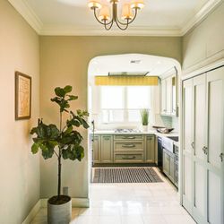 Heyler Realty - West Hollywood Condo Chandelier | entryway of Granville Towers home | Jae Wu & Sean McMillan Heyler Realty