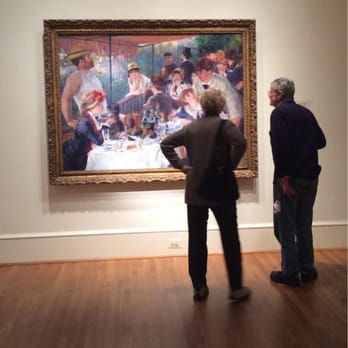 The Phillips Collection - A couple inspects one of the most famous paintings in the world: Renoir's The Boating Party. - Art Museums Near Me - Washington, DC, District of Columbia
