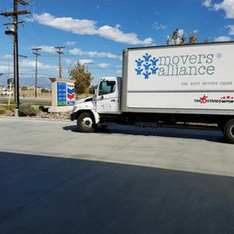 a delivery truck parked in a parking lot