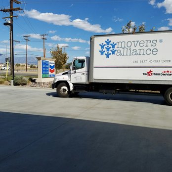 Chevron - a delivery truck parked in a parking lot - Gas Stations Near Me - Moreno Valley, California
