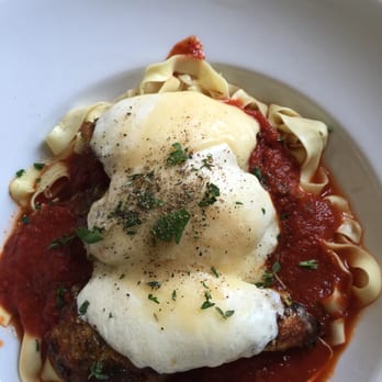 Five Loaves Cafe - CHICKEN PARMESAN. Herb-parmesan crusted all natural chicken topped with a tomato basil sauce and fresh mozzarella over fettuccine. - Sandwiches Near Me - Summerville, South Carolina
