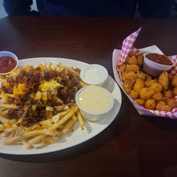 Nikki's Tavern - Cheese fries and cheese curds - Sports Bars Near Me - Lebanon, Ohio Nikki's Tavern - Cheese fries and cheese curds - Sports Bars Near Me - Lebanon, Ohio