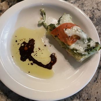 Geppetto's - Pesto bruschetta with olive oil and vinegar - Pizza Near Me - Salem, Oregon Geppetto's - Pesto bruschetta with olive oil and vinegar - Pizza Near Me - Salem, Oregon