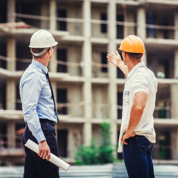 Precision Estimator LLC - two construction workers talking - General Contractors Near Me - Rocky Mount, North Carolina Precision Estimator LLC - two construction workers talking - General Contractors Near Me - Rocky Mount, North Carolina