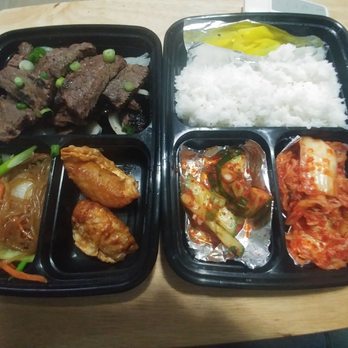 Kim's Korean BBQ Restaurant - Galbisal (short ribs) Bento Box w/ mandu (dumplings), noodles, banchan and rice - excellent! - Korean Near Me - Jacksonville, Florida Kim's Korean BBQ Restaurant - Galbisal (short ribs) Bento Box w/ mandu (dumplings), noodles, banchan and rice - excellent! - Korean Near Me - Jacksonville, Florida