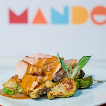 Mando - a plate of food on a table - Food Delivery Services Near Me Mando - a plate of food on a table - Food Delivery Services Near Me