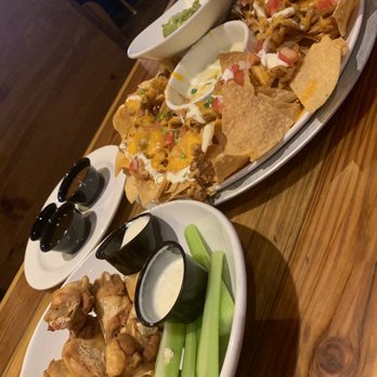 Miller's Ale House - Chicken Nachos, And wings with (Caribbean Jerk, Honey Spice, and Sweet Thai Chili Sauce) - American Near Me - Springfield, Pennsylvania Miller's Ale House - Chicken Nachos, And wings with (Caribbean Jerk, Honey Spice, and Sweet Thai Chili Sauce) - American Near Me - Springfield, Pennsylvania