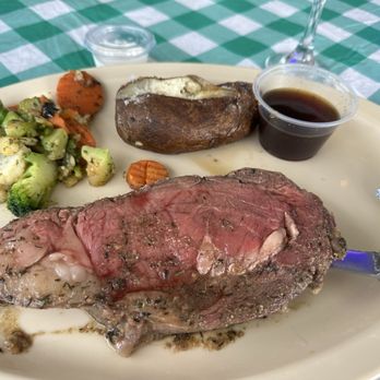 Southside Grille - Queen Cut Prime Rib rare with baked potato and vegetables, delicious! - New American Near Me - Bunnell Florida, Florida