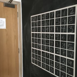 Sudoku on the hotel room wall. Look away if you don't want the answers!