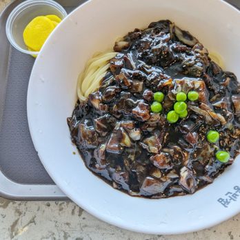 Paik's Noodle - Jajangmyeon is a Korean Chinese dish of noodles topped with a thick, savory black bean sauce. - Korean Near Me - Los Angeles, California Paik's Noodle - Jajangmyeon is a Korean Chinese dish of noodles topped with a thick, savory black bean sauce. - Korean Near Me - Los Angeles, California