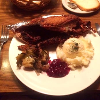 Smakosz Restaurant - Roasted Duck with apple stuffing, mashed potatoes, cranberry sauce. - Polish Near Me - Chicago, Illinois Smakosz Restaurant - Roasted Duck with apple stuffing, mashed potatoes, cranberry sauce. - Polish Near Me - Chicago, Illinois