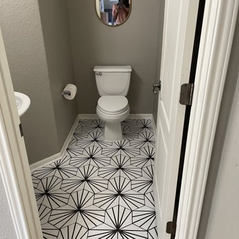 Mario's Flooring - a woman taking a selfie in the mirror - Flooring Near Me Mario's Flooring - a woman taking a selfie in the mirror - Flooring Near Me