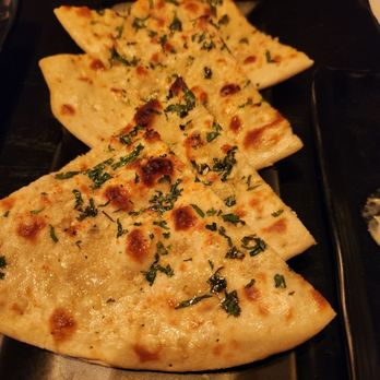 Dhoom - Garlic Naan - Indian Near Me - McLean, Virginia