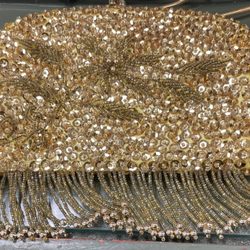 Broach, purse, and ring