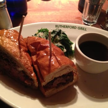 Rutherford Grill - Prime rib sandwich with French dip with sautéed spinach - American Near Me - Rutherford, California