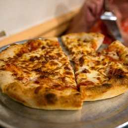 Small pizza with extra cheese and bacon Small pizza with extra cheese and bacon