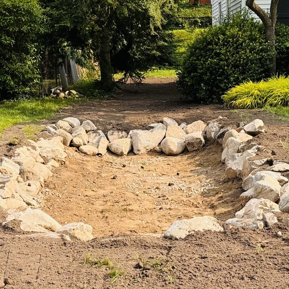 Knight's Grading & Excavating - Newly built, rock lined, rain garden. - Waterproofing Near Me - Pinckney, Michigan Knight's Grading & Excavating - Newly built, rock lined, rain garden. - Waterproofing Near Me - Pinckney, Michigan