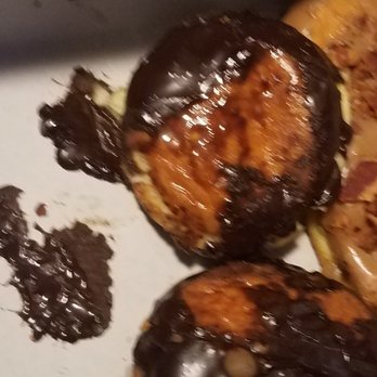 Frosty's Donuts - All 4 chocolate donuts look the same way. My son didn't care he will eat anything - Coffee & Tea Near Me - Barstow, California