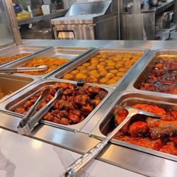 Green Fresh Supermarket - Hot foods. By the weight. $2.59/100g.