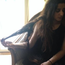 Shear Performance Hair Designs - this the damage to my hair after I brushed it out as much as I could.