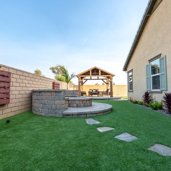 Beautiful Artificial Grass Putting Green Fire Pit Pergola And
