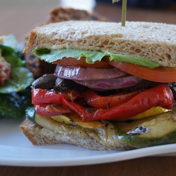 Cafe Rose Express - Half sandwich (portobello) and half salad (Mediterranean) with zucchini bread as a side. - American Near Me - Costa Mesa, California Cafe Rose Express - Half sandwich (portobello) and half salad (Mediterranean) with zucchini bread as a side. - American Near Me - Costa Mesa, California