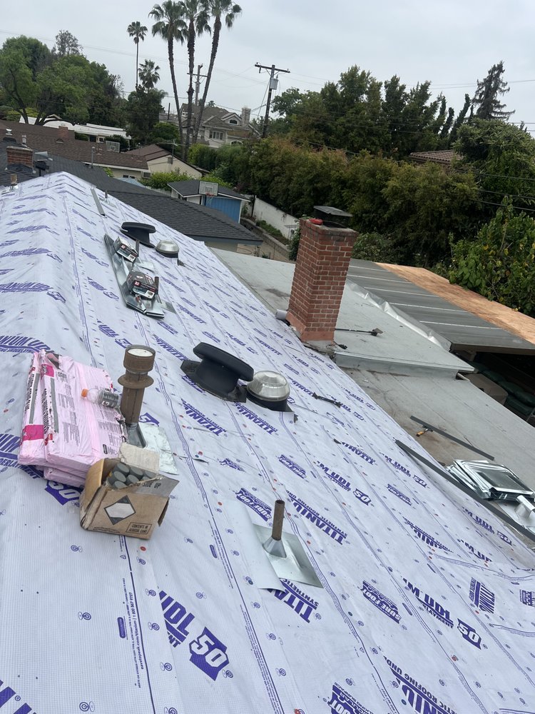 Slide of Heritage Roofing Solutions