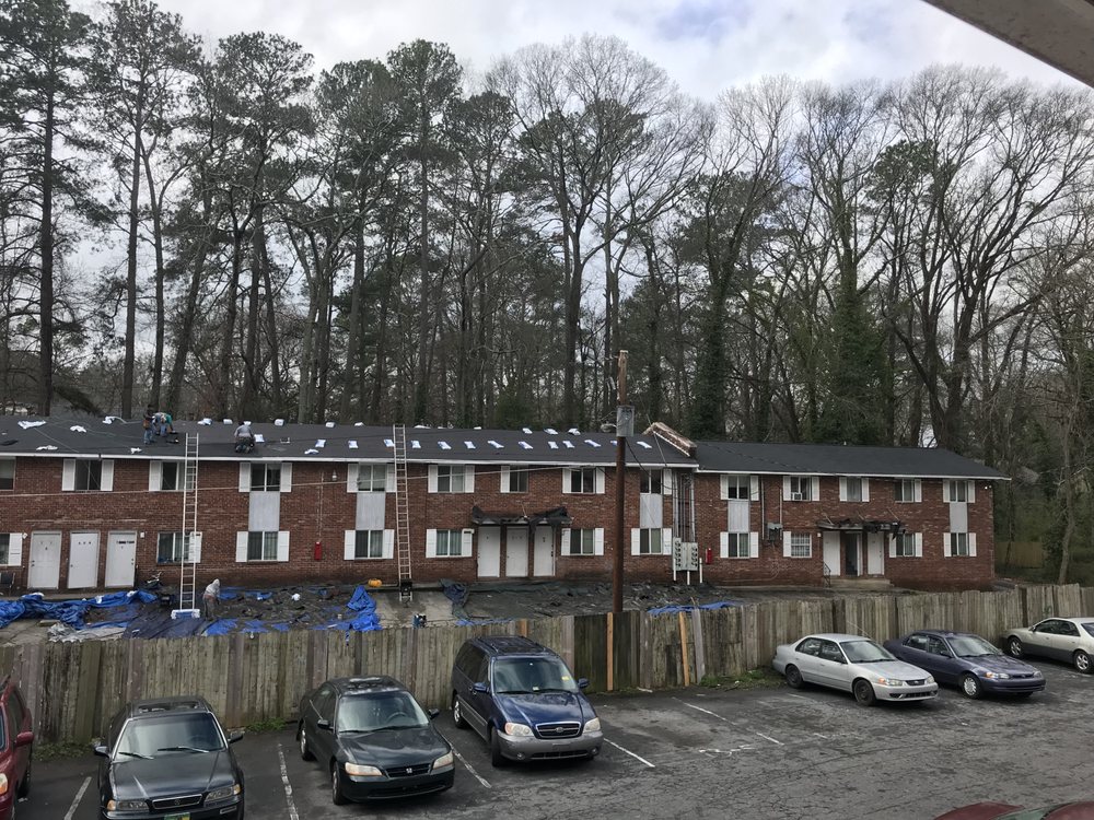 Slide of Merk Roofing