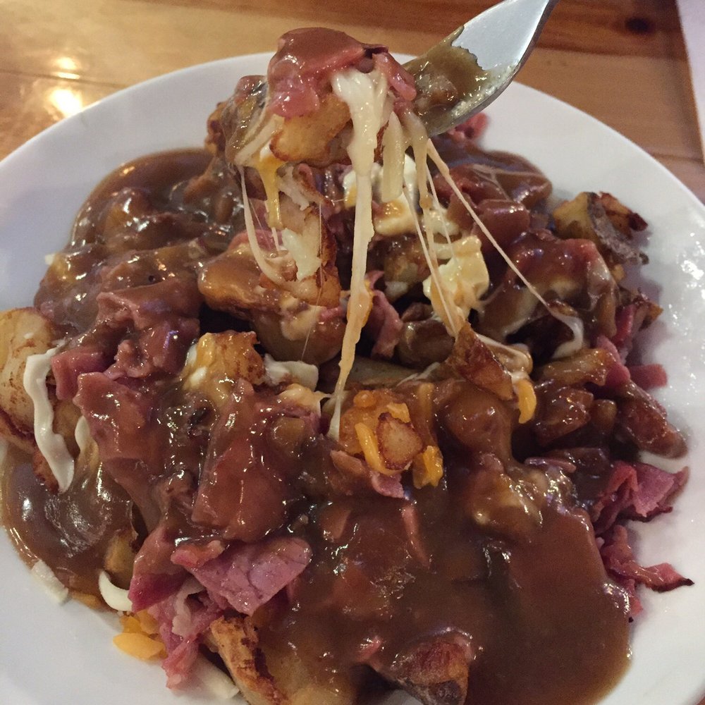 Poutineville - Hand crushed poutine with four cheeses and smoked meat - Poutineries Near Me - Montreal, Quebec