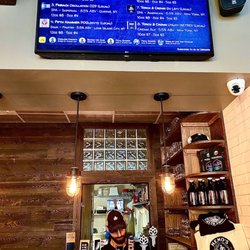 Nemo’s Beer Shop - Owner working the taps.
