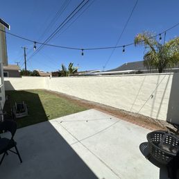 Refinished wall, painted to match the house. Refinished wall, painted to match the house.
