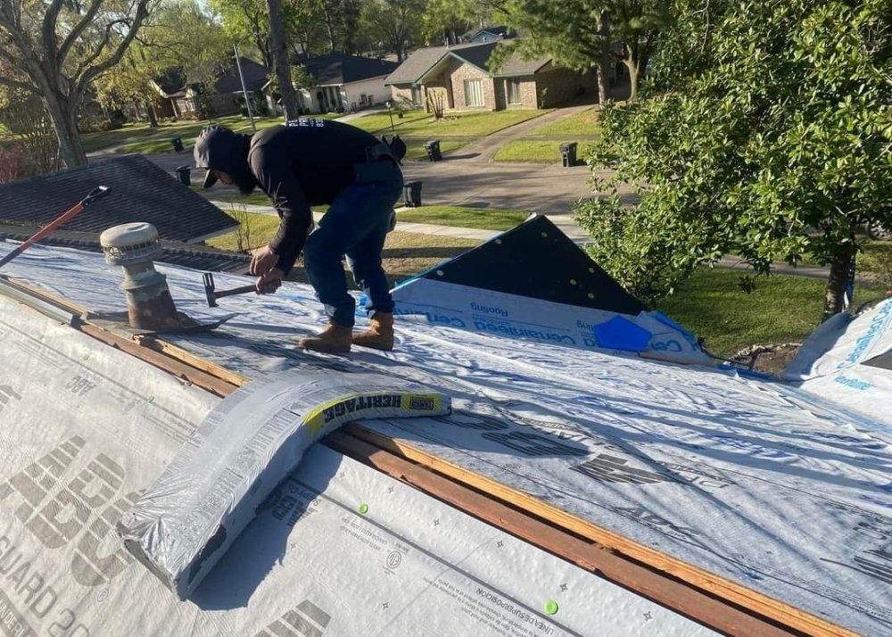 Slide of Archie's Roofing & Construction
