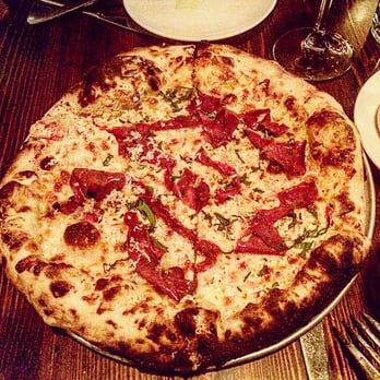 Coppa Enoteca - Bone marrow pizza with roasted tongue and fresh horseradish. - Italian Near Me - Boston, Massachusetts Coppa Enoteca - Bone marrow pizza with roasted tongue and fresh horseradish. - Italian Near Me - Boston, Massachusetts