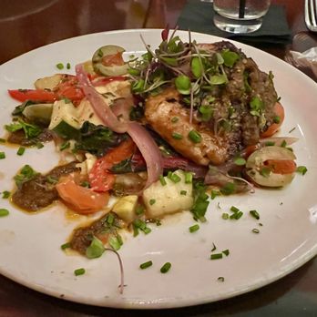 Kres Chophouse - Grilled Mahi with polenta and vegetables - Steakhouses Near Me - Orlando, Florida Kres Chophouse - Grilled Mahi with polenta and vegetables - Steakhouses Near Me - Orlando, Florida