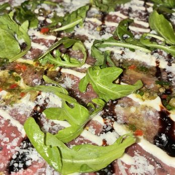 Aris Steakhouse - Steakhouses Near Me - Austin, Texas