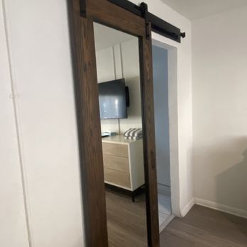 Hotel Cabana - Barn door covers bathroom and closet - Hotels Near Me - Clearwater, Florida Hotel Cabana - Barn door covers bathroom and closet - Hotels Near Me - Clearwater, Florida
