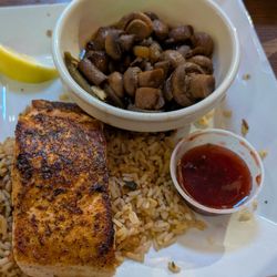Colton's Steakhouse & Grill - Blackened salmon with sauteed mushrooms