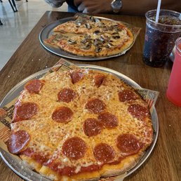 Pepperoni pizza and mushroom pizza Pepperoni pizza and mushroom pizza