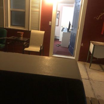 Big Horn Motel - Covered front porch, grill, chairs outside to smoke. - Hotels Near Me - Buffalo, Wyoming Big Horn Motel - Covered front porch, grill, chairs outside to smoke. - Hotels Near Me - Buffalo, Wyoming