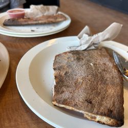 Racanellis New York Pizzeria - Pizza by the Slice - burnt and hard crust