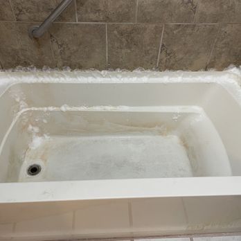 Two Maids - Peoria - Tub being pretreated for soap scum and red mold/mildew. - Home Cleaning Near Me - Peoria, Arizona Two Maids - Peoria - Tub being pretreated for soap scum and red mold/mildew. - Home Cleaning Near Me - Peoria, Arizona
