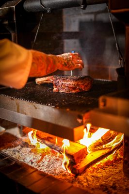 Photo of Repeal Oak Fired Steakhouse - Louisville, KY, US. At Whiskey Row's only oak-fired steakhouse you'll savor steaks cooked over a fire stoked daily with American Oak bourbon barrel staves.'